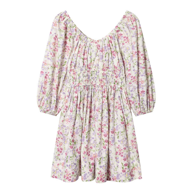 Women's floral dress with smocked waist and voluminous puff sleeves Fashion Glam