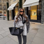 Women's short coat made of voluminous faux fur with wide shawl collar Fashion Glam