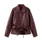 Women's short jacket made of faux leather with a belted waist and shirt collar Fashion Glam