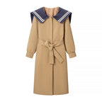Women's coat with oversized sailor collar, belted waist and concealed button placket Fashion Glam