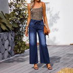 Women High-waisted wide jeans with bow waistband and patch pockets Fashion Glam