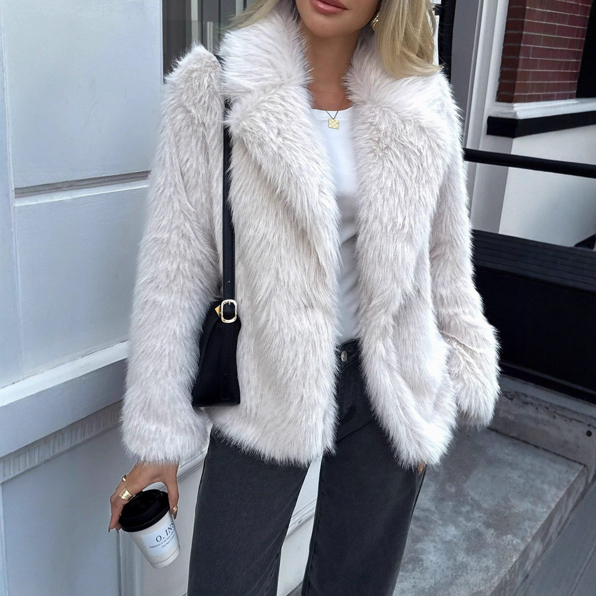 Ladies short jacket made of dense high-pile faux fur with voluminous lapel Fashion Glam