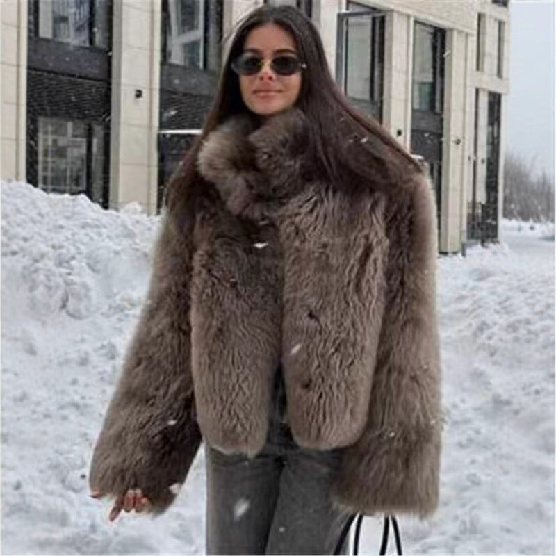 Ladies short jacket made of voluminous faux fur with high collar and boxy silhouette Fashion Glam