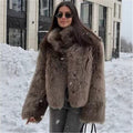 Ladies short jacket made of voluminous faux fur with high collar and boxy silhouette Fashion Glam