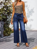 Women High-waisted wide jeans with bow waistband and patch pockets Fashion Glam
