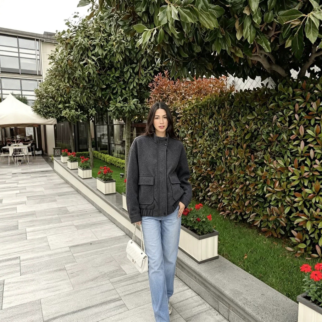 Women's wool blend blouson jacket with stand-up collar, large flap pockets, and elastic hem Fashion Glam