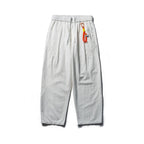 Unisex locker cut cropped leisure pants with elastic waistband, drawstring, and carabiner detail Fashion Glam