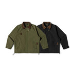 Unisex boxy overshirt jacket in utility style with cord collar, flap pockets and drawstring hem Fashion Glam