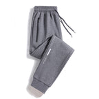 Men's Sporty Jogging Pants with Zipper Pocket, Drawstring, and Elastic Cuffs Fashion Glam