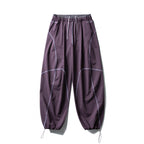 Unisex locker cut tech jogging pants with elastic waistband, distinctive flatlock seams and drawstring Fashion Glam