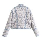 Women's quilted short jacket in kimono style with floral quilted look and contrasting piping Fashion Glam
