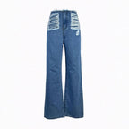 Women's high-cut wide denim jeans with heavily distressed front and raw waistband Fashion Glam