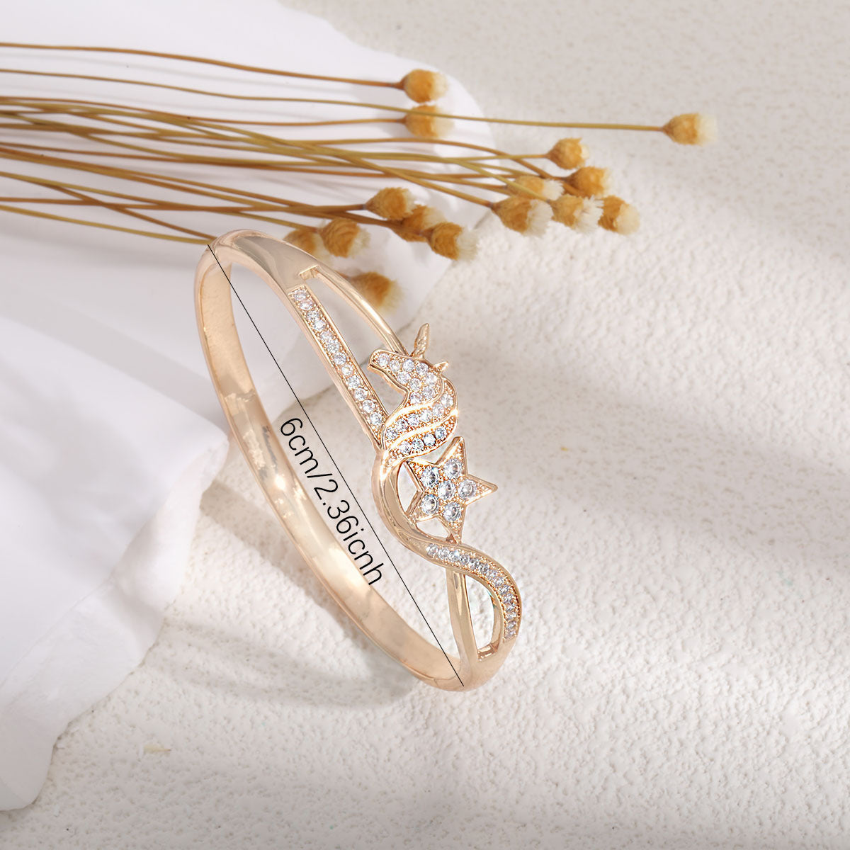 Ladies bracelet with elaborate infinity symbol and sparkling zirconia Fashion Glam