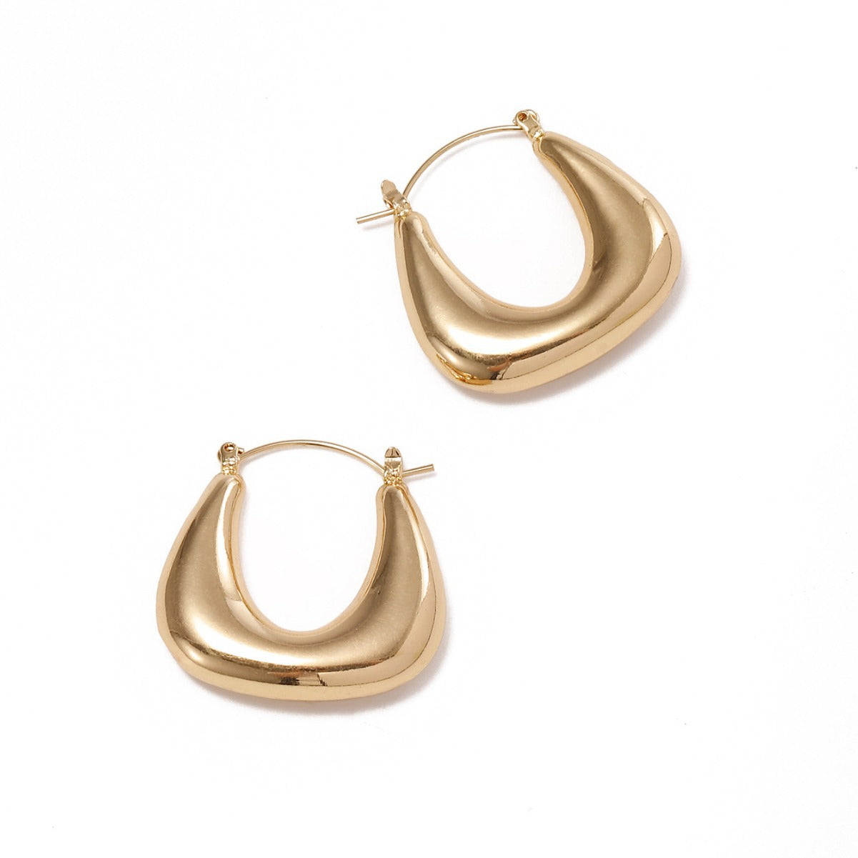 Ladies earrings in a modern, curved design Fashion Glam