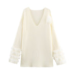 Ladies fine knit mini dress with deep V-neckline and layered faux fur sleeves Fashion Glam