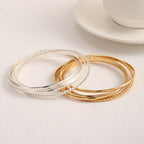 Women's bangle set with elaborate, braided and simple designs Fashion Glam