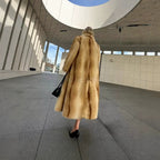 Women’s longer luxurious fur coat with wide lapels and concealed button placket Fashion Glam