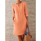 Women loose-fitting linen-look dress with three-quarter sleeves, button placket and side pockets Fashion Glam