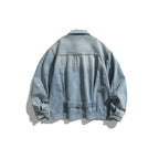 Men's oversized denim jacket in vintage look with slight used effect and chest pockets Fashion Glam