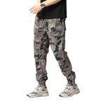 Men's cargo pants in jogger style with camouflage, elastic cuffs, and multifunctional pockets Fashion Glam