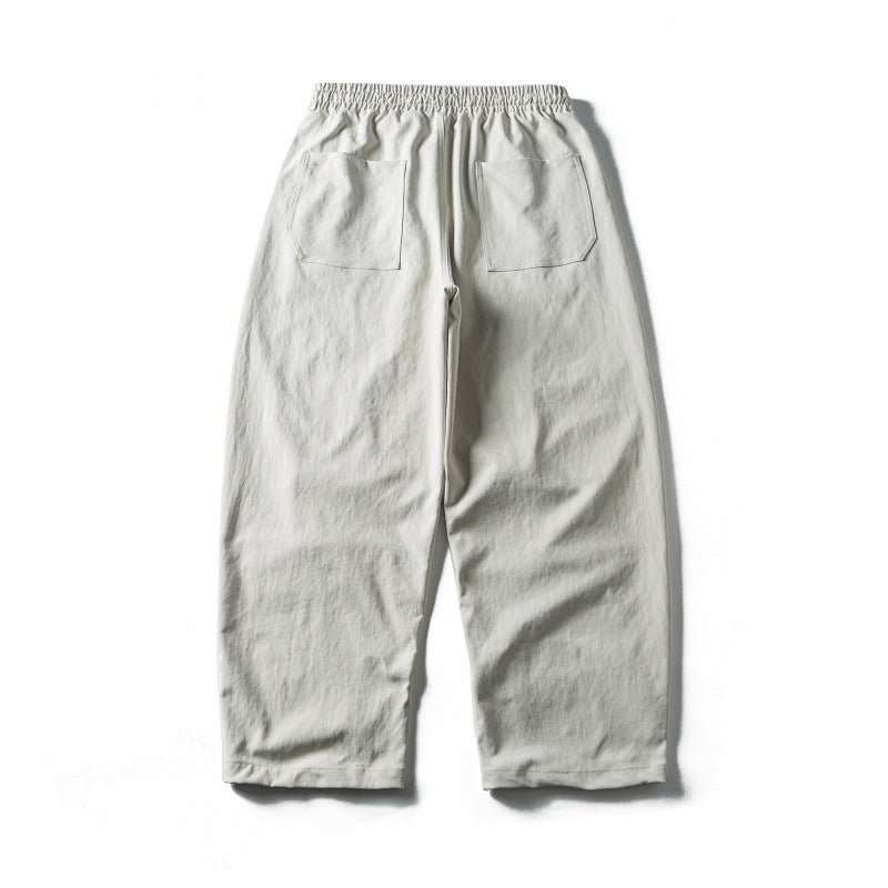 Unisex Wide Cropped Pants with Drawstring, Elastic Waistband and Distinctive Seam Panels Fashion Glam