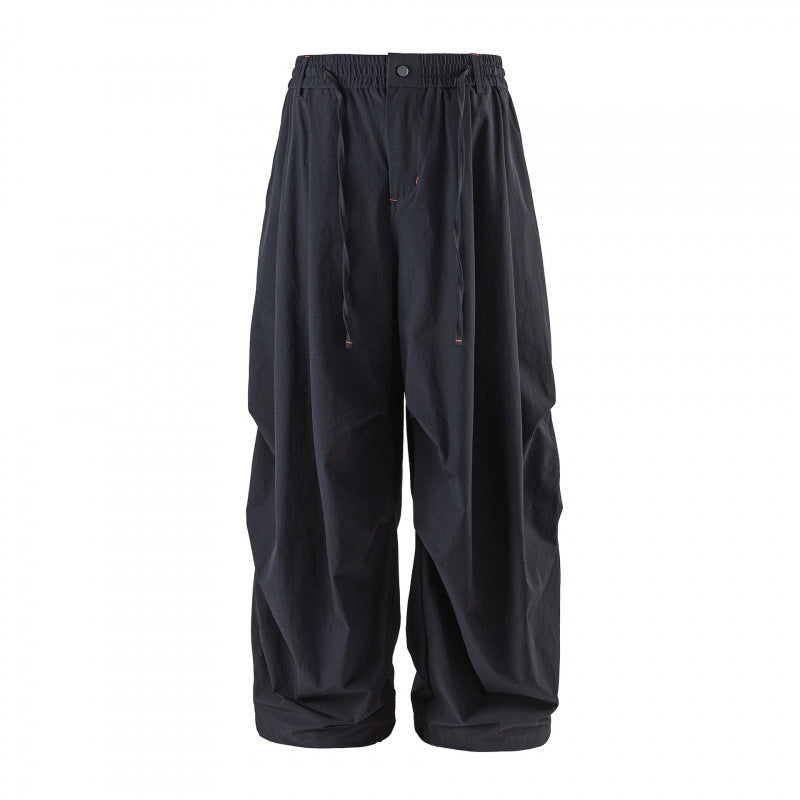 Unisex Loose-fitting technical cargo pants with elastic waistband, drawstring, and zip pockets Fashion Glam