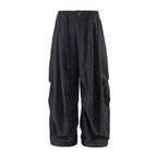 Unisex Loose-fitting technical cargo pants with elastic waistband, drawstring, and zip pockets Fashion Glam