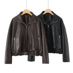 Women’s cropped oversized leather jacket in bomber style with zippered pockets and waist belt Fashion Glam