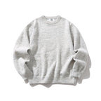 Unisex Oversize fine knit sweater with round neckline, ribbed cuffs, and mottled wool blend Fashion Glam