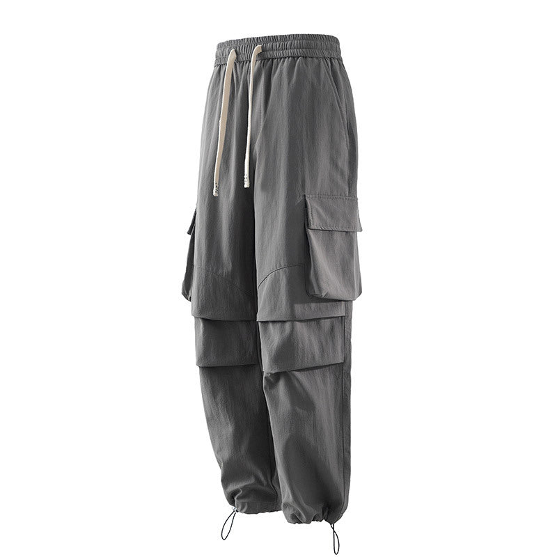 Men's cargo pants with elastic waistband, layered detail and zip hem Fashion Glam