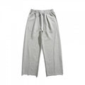 Unisex Loose Cotton Fleece Jogging Pants with Drawstring, Decorative Front Seams and Raw Hem Fashion Glam