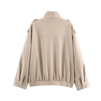 Women's short jacket in utility bomber style with flap pockets, shoulder tabs, and elastic hem Fashion Glam