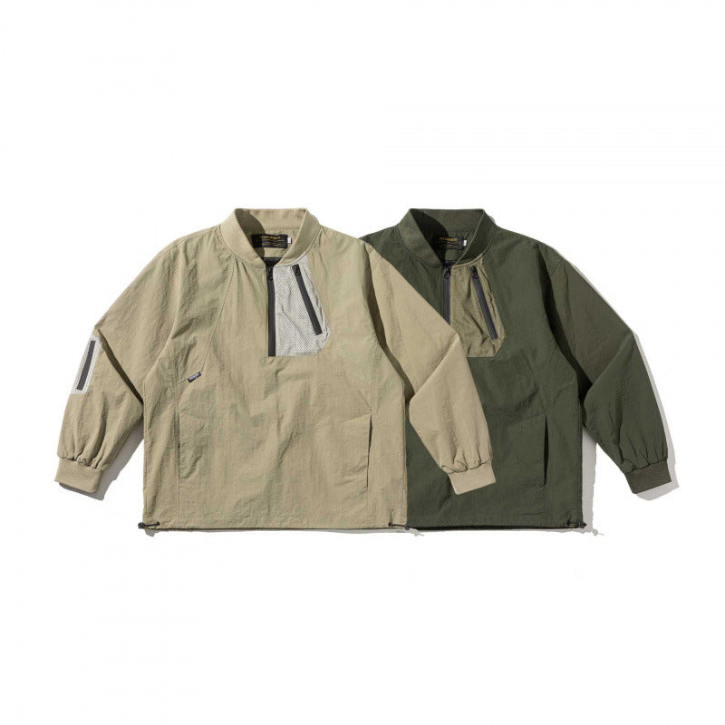 Unisex Lightweight Oversized Anorak with Half Zipper, Utility Pockets and Drawstring Hem Fashion Glam