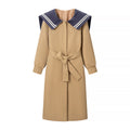Women's coat with oversized sailor collar, belted waist and concealed button placket Fashion Glam