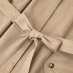 Women's short trench coat with waist belt, shoulder flaps, and patch pockets Fashion Glam