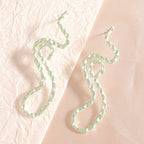 Ladies earrings in elegant wave pattern Fashion Glam