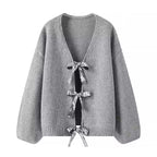 Women's Oversized Knit Cardigan with Deep V-Neck and Decorative Bows Fashion Glam