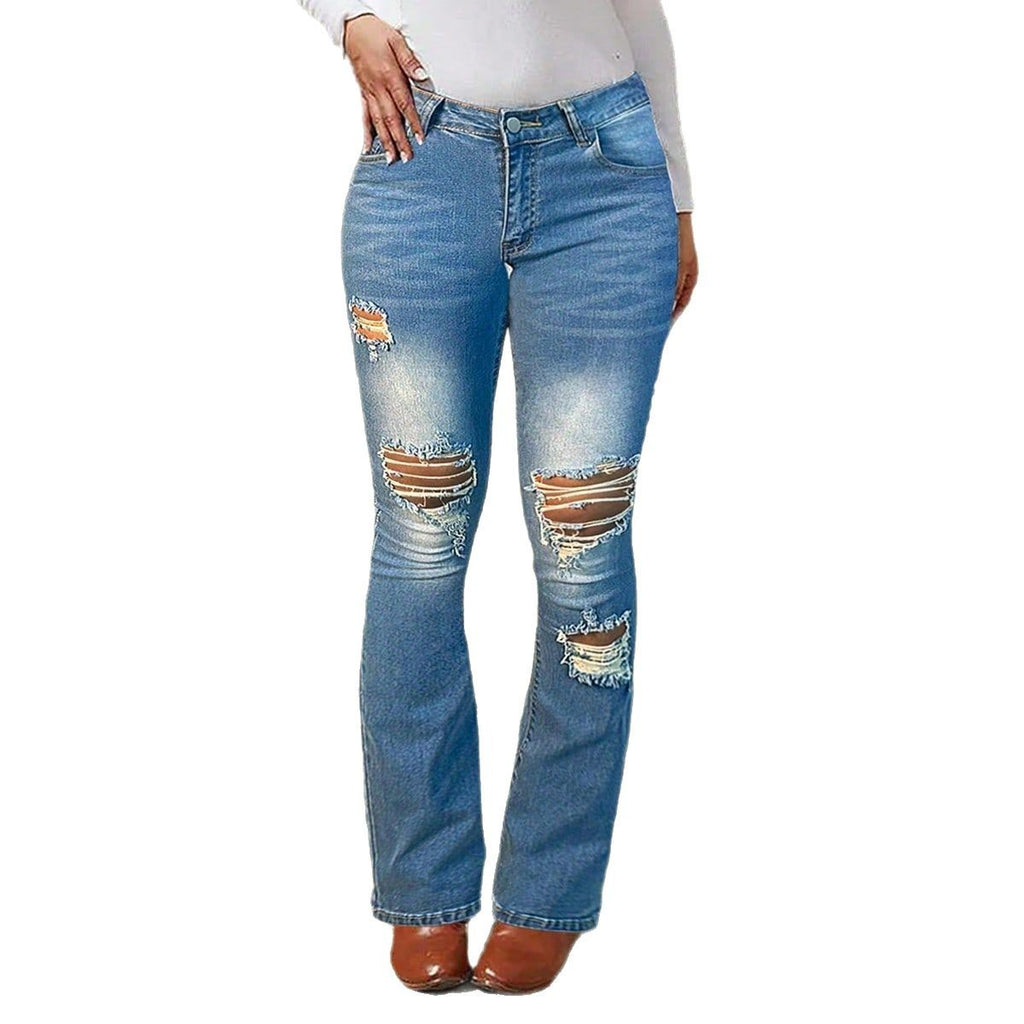 Women's waist-accentuated stretch denim jeans with flared leg and prominent knee rips Fashion Glam