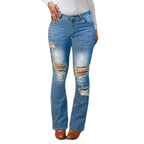 Women's waist-accentuated stretch denim jeans with flared leg and prominent knee rips Fashion Glam