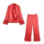 Ladies high-waisted satin pants with jacquard floral pattern and feather fringes Fashion Glam