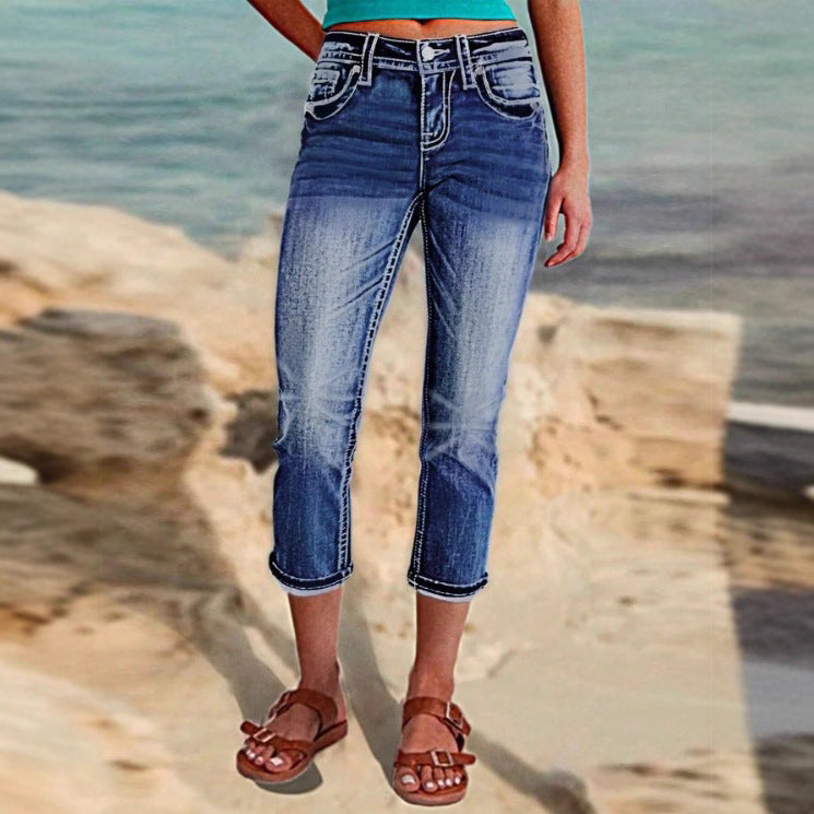 Women's cropped jeans with turn-up, mid-rise waist and used wash Fashion Glam