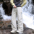 Unisex Water-repellent technical Cargo pants with wide leg, zip pockets and drawstring Fashion Glam