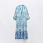 Women's maxi dress in patchwork print with V-neck, tiered skirt, and 3/4 sleeves Fashion Glam