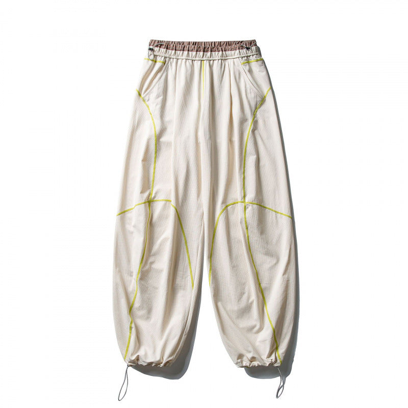 Unisex locker cut tech jogging pants with elastic waistband, distinctive flatlock seams and drawstring Fashion Glam