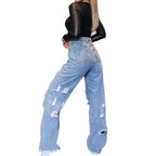 Ladies High-Waisted Baggy Jeans with Large Destruction Rips and Frayed Hem Fashion Glam