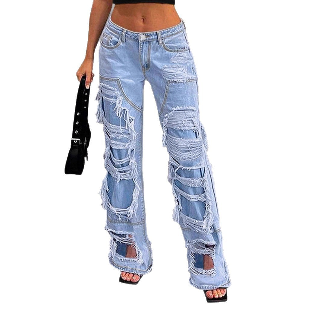 Women high-cut heavily ripped denim jeans with wide leg and decorative seam panels Fashion Glam