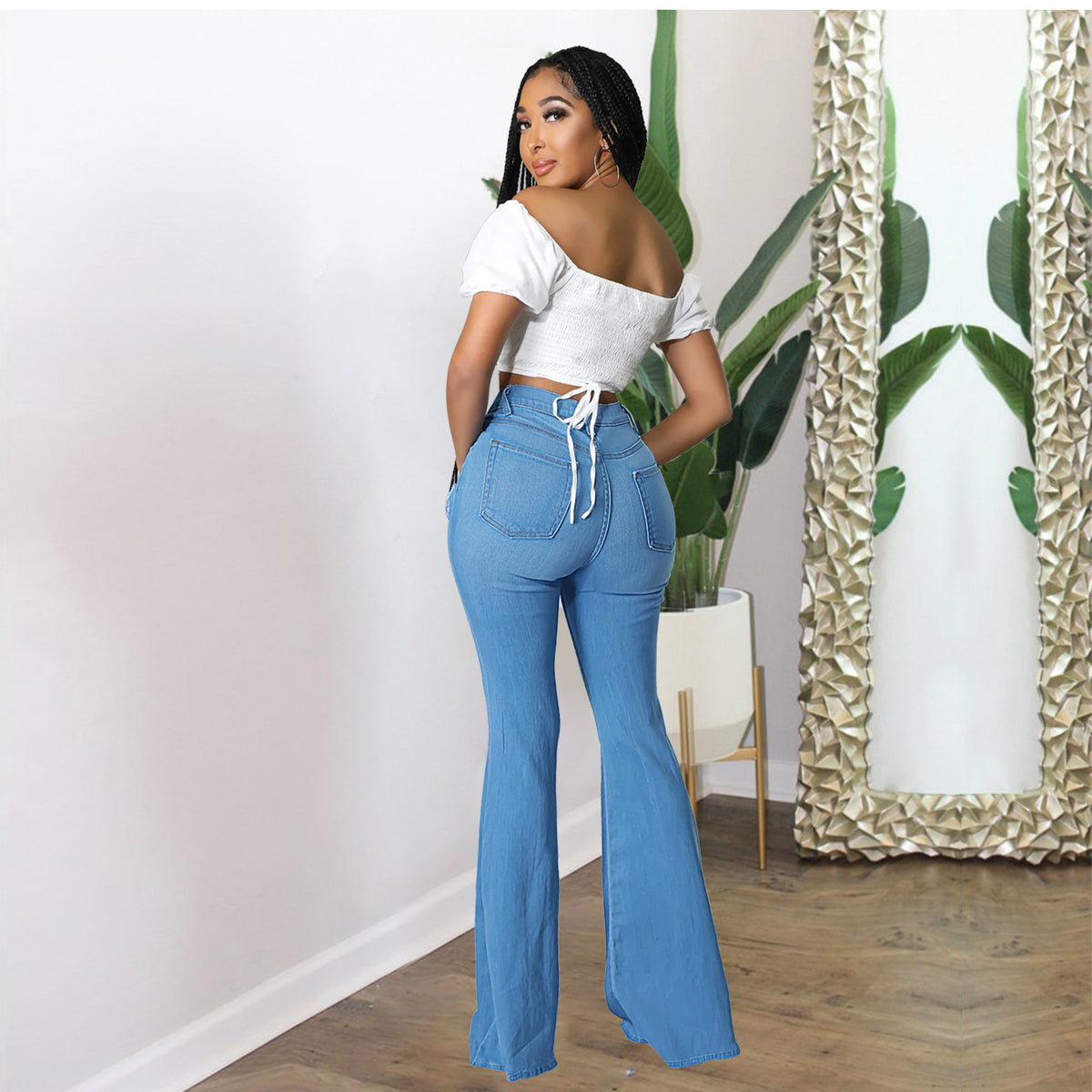 Women's high-waisted flared pants made of stretch denim with knee rips and shaping waistband Fashion Glam