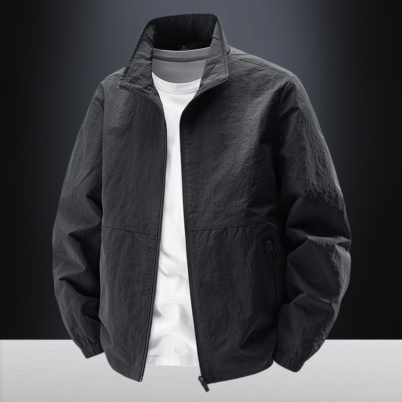 Men's minimalist functional jacket with stand-up collar, breathable mesh lining, and water-repellent zippers Fashion Glam