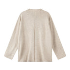 Unisex Oversize knit sweater with Henley button placket, straight hem and light texture Fashion Glam