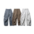 Men's wide cargo pants with asymmetrical flap pockets and cropped leg Fashion Glam